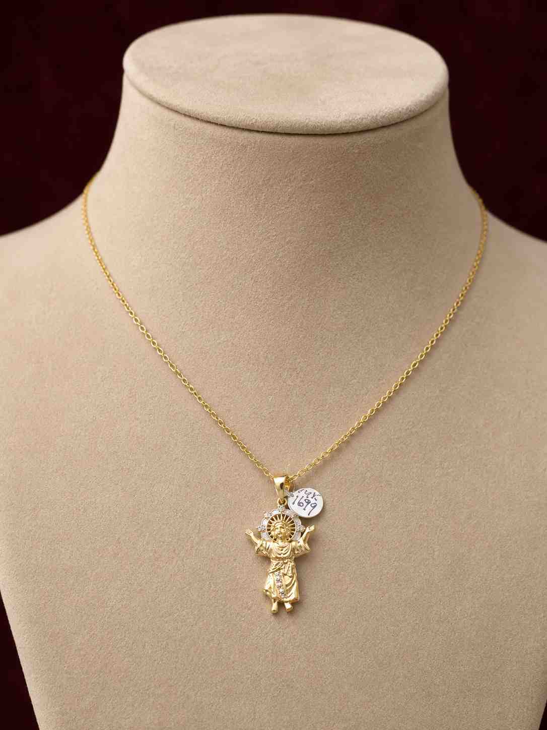 Divino Niño (Divine Child) pendant.
