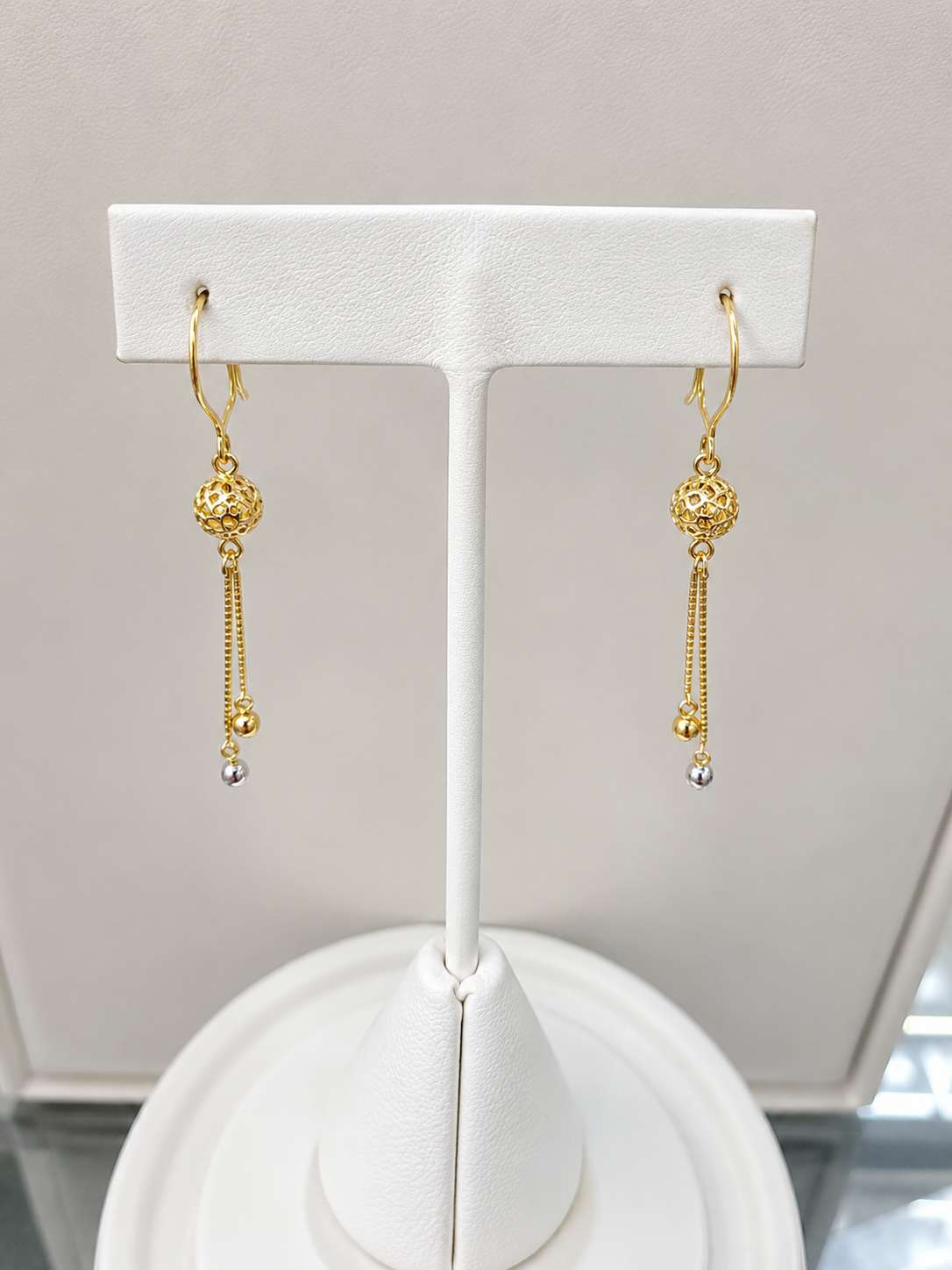 Elegant Dangling Gold Earrings - Image 3